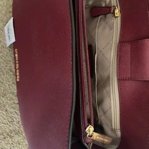 Beautiful deep cherry red brand new Michael Kors purse!